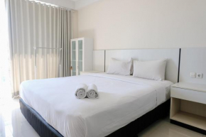 Homey and Cozy Studio Apartment at Dago Suites By Travelio